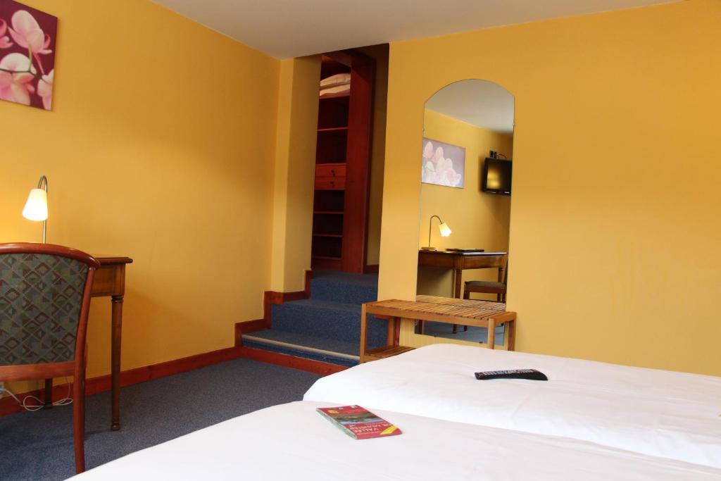 Hotel Restaurant La Cigogne Munster  Rom bilde